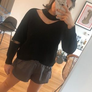 Black cutout nastygal sweater with zipper details.
